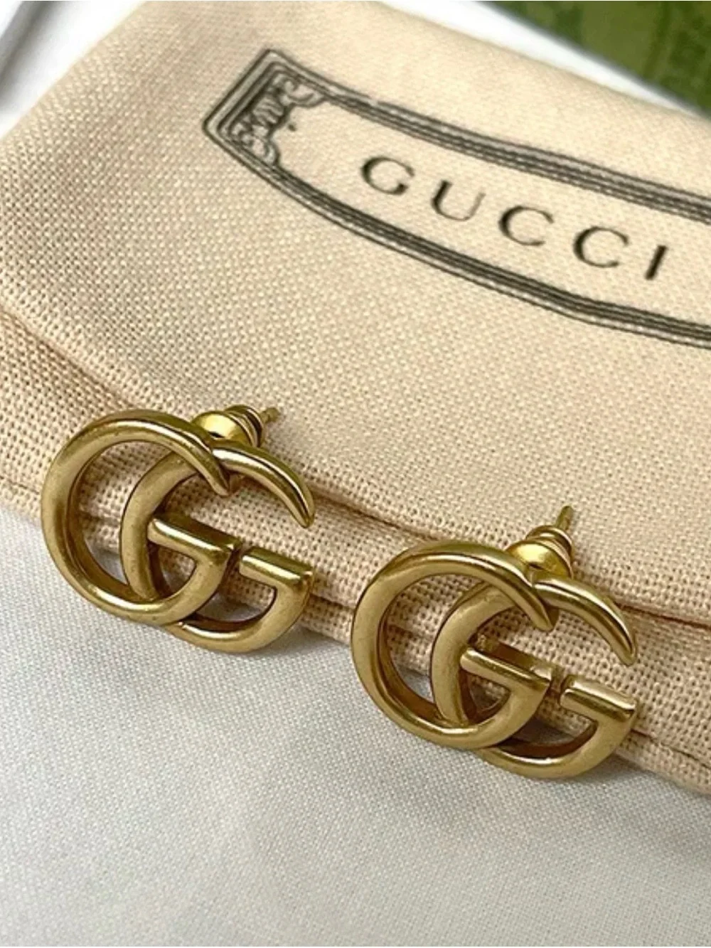 Gucci Gold tone Double G Logo Earrings with Branded Pouch